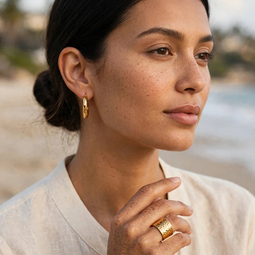 Model wearing the Aura Hammered Wide Ring